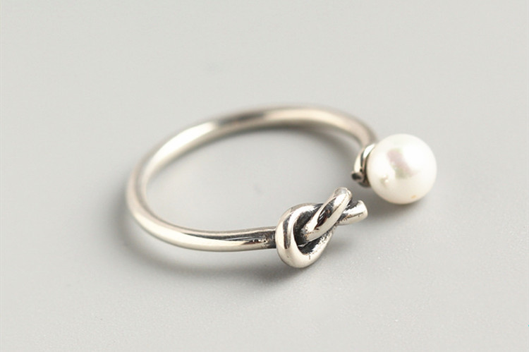 Knot ring with Japanese and Korean personality, cold style design, asymmetric single knot pearl opening ring, e-commerce source-1